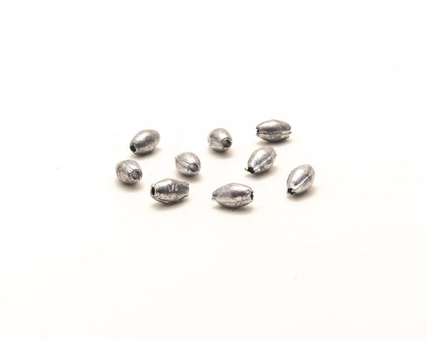 Group of silver egg sinkers fishing accessories isolated on white background. Ideal for Carolina rigging allow anglers to get down deep for ground bottom fishing