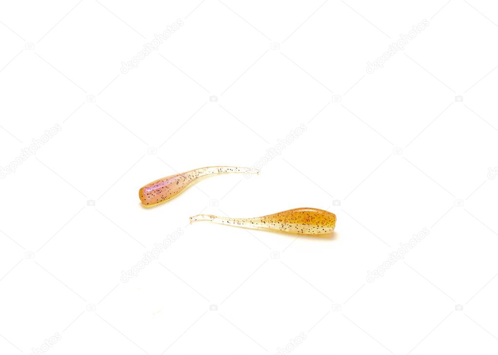 Two soft plastic baits for crappie fishing isolated on white background. Pink color durable minnows fishing tackle gear