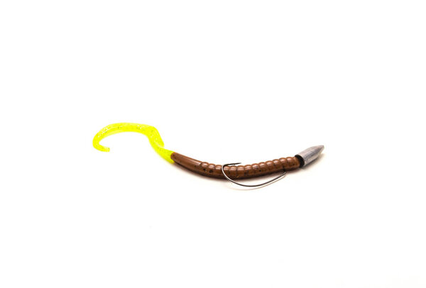 Texas rig fishing terminal tackle with plastic worm, bullet shape sinker and offset worm hook isolated on white background. Glowing green pumpkin lure bait for bass fishing freshwater
