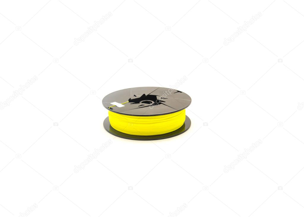 Top view a brand new spool of yellow braided fishing line isolated on white background. Polyethylene braid fiber with small diameter