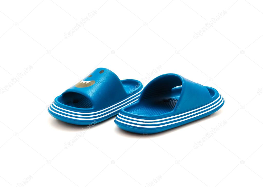 Trending pair of open toe pillow slide sandals for toddler isolated on white background. Cushioned foam slippers for boys and girls