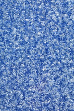Buzlu doku, camdaki desen. Mavi doğal arka plan. Soyut doku.