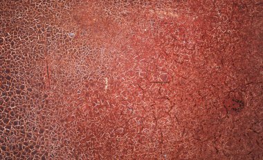 Metal bir yüzey dokusundaki eski çatlak boyanın soyut arkaplanı