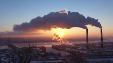 Greenhouse gas emissions. Pollution of factories. Dirty air over the city. Negative impact on human health