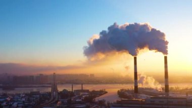 Greenhouse gas emissions. Pollution of factories. Dirty air over the city. Negative impact on human health