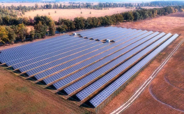 Solar power plant. Renewable source of electricity, environmentally friendly energy carrier Huge photovoltaic plant drone view
