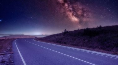 A wonderful seascape. High-quality asphalt road in the mountains before dawn.