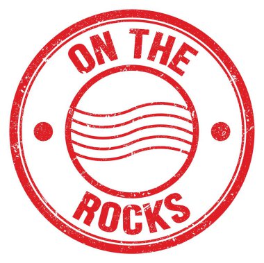 ROCKS üzerinde kırmızı yuvarlak posta pulu işareti üzerine yazılmış metin