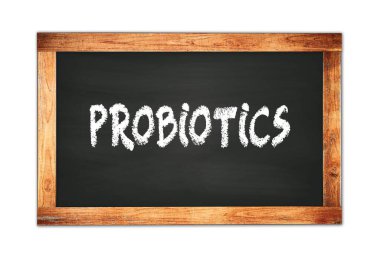 Siyah ahşap çerçeveli okul tahtasına yazılmış PROBIOTICS metni.