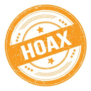 Turuncu yuvarlak grungy doku damgası üzerine HOAX metni.