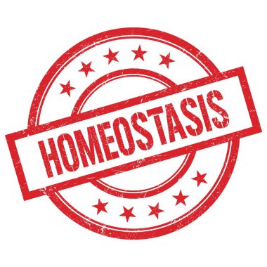Kırmızı yuvarlak plastik damga üzerine yazılmış HOMEOSTASIS metni.