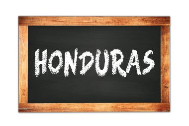 Siyah ahşap çerçeve okul tahtasına yazılmış HONDURAS metni.