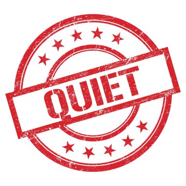 Kırmızı yuvarlak vintage kauçuk damga üzerine yazılmış sükunet metni.