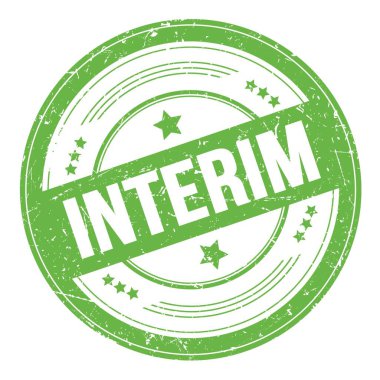 Yeşil yuvarlak grungy doku damgası üzerine INTERIM metni.