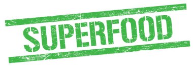 Yeşil grungy dikdörtgen işareti üzerinde SUPERFOOD metni.