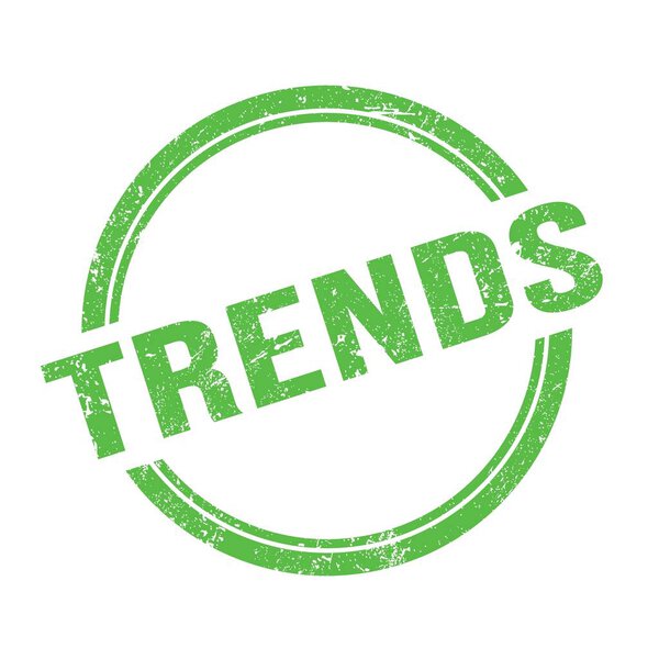 TRENDS text written on green grungy vintage round stamp.