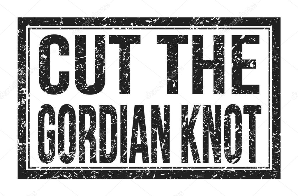 CUT THE GORDIAN KNOT, words written on black rectangle stamp sign