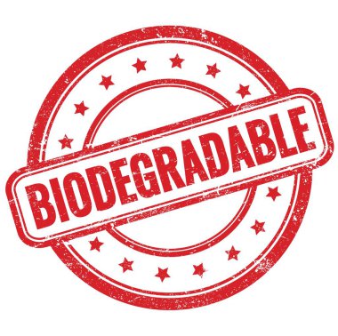 Kırmızı, eski, kirli, yuvarlak, lastik damgalı BIODEGRADable metni.