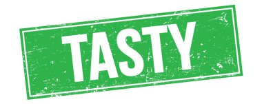 Yeşil grungy dikdörtgen damga işareti üzerinde lezzetli metin.