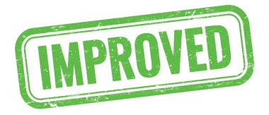 Yeşil grungy vintage dikdörtgen pulu üzerinde IMPROVED metin.