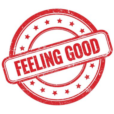 Kırmızı, eski, pasaklı, yuvarlak, lastik damga üzerine güzel bir yazı..