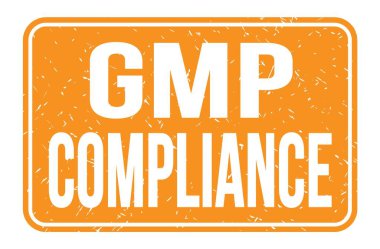 GMP COMPLIANCE, turuncu dikdörtgen mühür işareti üzerine yazılmış kelimeler