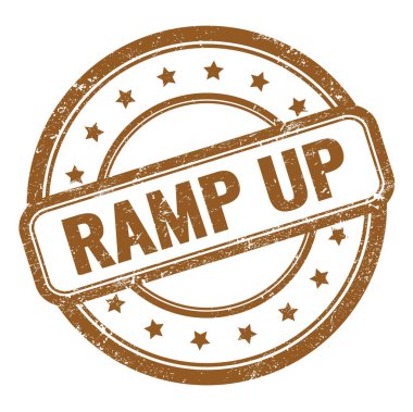 Kahverengi grungy vintage yuvarlak kauçuk damga üzerinde RAMP up metin.