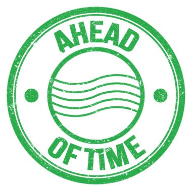 Yeşil yuvarlak posta damgası üzerine yazılan Time metninin ilerisinde