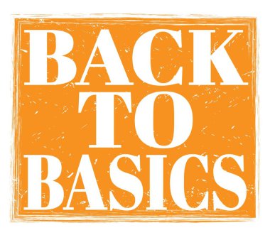 BASICS 'e dönüş, turuncu grungy işareti üzerine yazılmış.