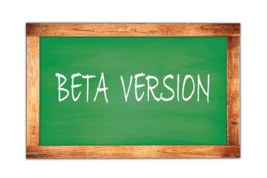 Yeşil ahşap çerçeve okul tahtasına yazılmış BETA VERSION metin.