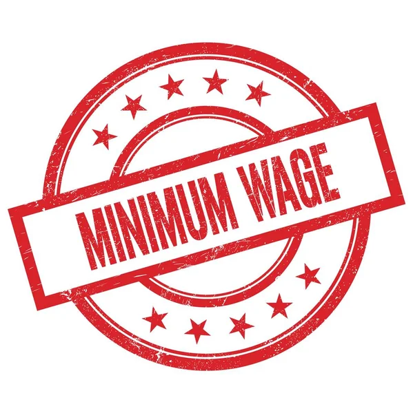 MINIMUM WAGE kırmızı yuvarlak lastik mühür üzerine yazılmış metin.