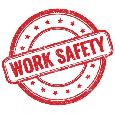 Kırmızı, eski, kirli, yuvarlak, lastik damga üzerine çalışma güvenliği metni.