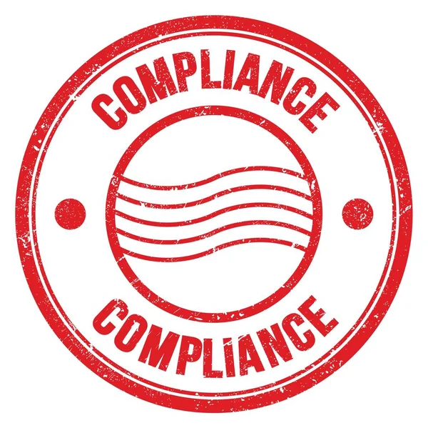 Kırmızı yuvarlak posta damgası üzerine yazılmış COMPLIANCE sözcüğü