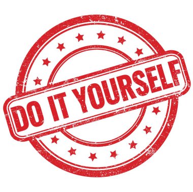 DO IT YOURSELF text on red vintage grungy round rubber stamp.