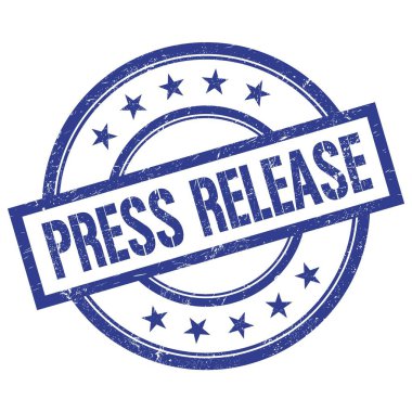 PRESS RELEASE text written on blue round vintage rubber stamp.