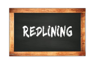 REDLINING text written on black wooden frame school blackboard.