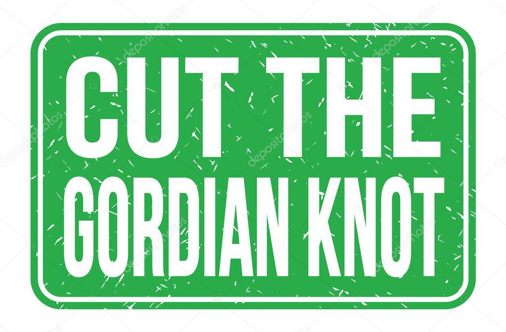 CUT THE GORDIAN KNOT, words written on green rectangle stamp sign