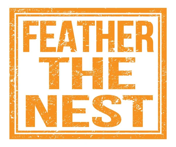 Feather Nest オレンジのグランジスタンプサインに書かれている — ストック写真