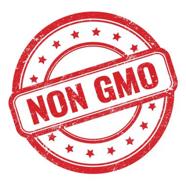 NON GMO text on red grungy vintage round rubber stamp.