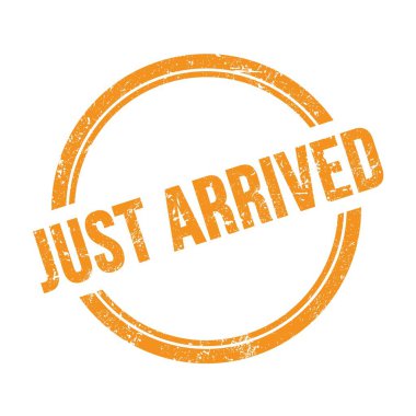 JUST ARRIVED text written on orange grungy vintage round stamp.