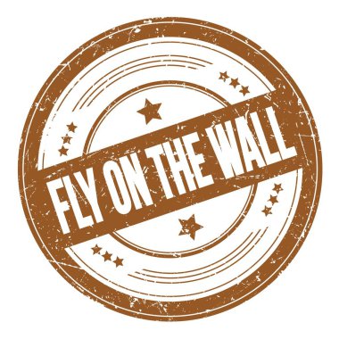 FLY ON THE WALL text on brown round grungy texture stamp.
