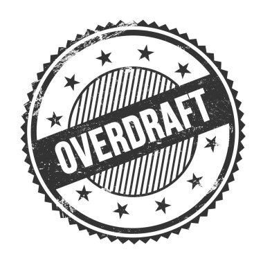 Siyah grungy zig zag kenarlarında yazılmış OVERDRAFT metni yuvarlak pul.