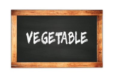 Siyah ahşap çerçeve okul tahtasına yazılmış VEGETable metin.