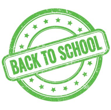 Yeşil, eski, kirli, yuvarlak, lastik damgalı okula dönüş metni.