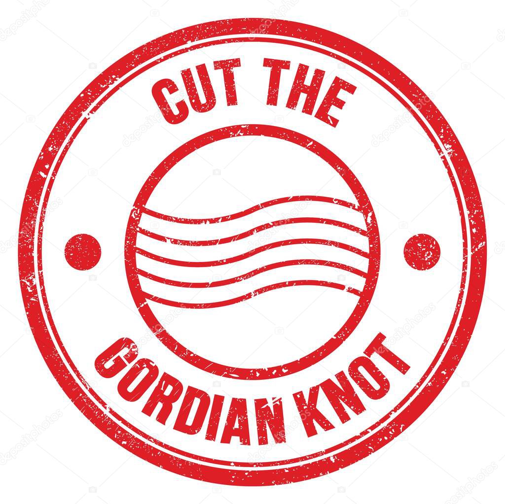 CUT THE GORDIAN KNOT text written on red round postal stamp sign