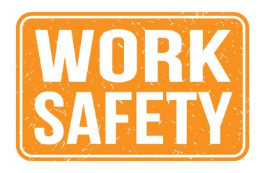 İş Güvenliği, turuncu dikdörtgen mühür işareti üzerine yazılmış kelimeler