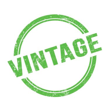 Yeşil grungy vintage yuvarlak pul üzerine yazılmış VINTAGE metin.