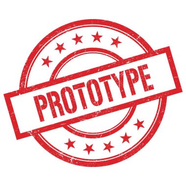 Kırmızı yuvarlak plastik damga üzerine yazılmış PROTOTYPE metni.