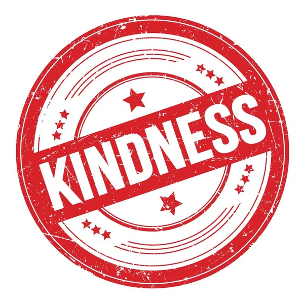 Kırmızı yuvarlak grungy desen damgası üzerine KINDNESS metin.