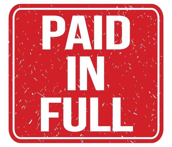 stock image PAID IN FULL, text written on red vintage stamp sign